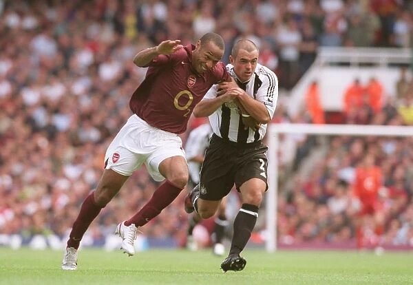 Thierry Henry (Arsenal) Stephen Carr (Newcastle). Arsenal 2:0 Newcastle United