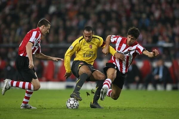 Thierry Henry (Arsenal) Timmy Simons and Manuel Da Costa (PSV)
