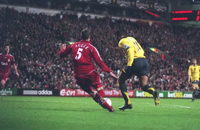 Framed Print : Thierry Henry breaks past Liverpool defender Daniel Agger to score the 3rd Arsenal goal