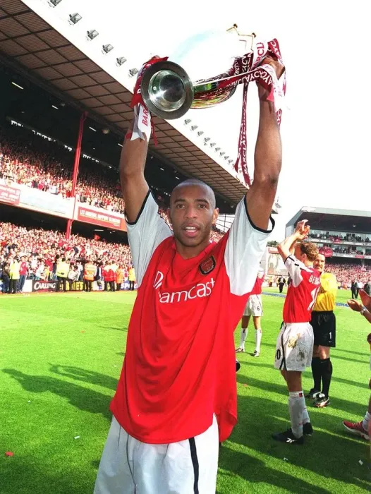 Framed Print : Thierry Henry Celebrates with the FA Barclaycard Premiership Trophy after Arsenal's 4:3 Win over Everton, Highbury, London, May 11, 2002 Framed Print : Thierry Henry Celebrates with the FA Barclaycard Premiership Trophy after Arsenal's 4:3 Win over Everton, Highbury, London, May 11, 2002