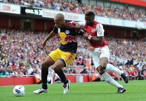 Thierry Henry (Red Bulls) and Alex Song (Arsenal). Arsenal 1: 1 New York Red Bulls