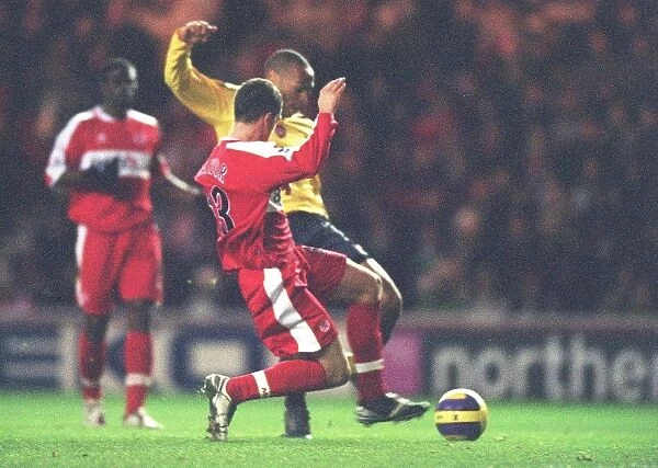 Thierry Henry shoots past Andrew Taylor and Middlesbrough goalkeeper Brad Jones to score the Arsenal goal. Middlesbrough 1: 1 Arsenal, The Premiership, The Riverside Stadium, Middlesbrough, 3  /  2  /  2007. Credit: Stuart MacFarlane  /  Arsenal