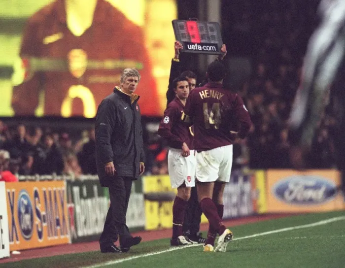Framed Print : Thierry Henry walks over to talk to Arsene Wenger the Arsenal manager as he brings on Robin van Pers Framed Print : Thierry Henry walks over to talk to Arsene Wenger the Arsenal manager as he brings on Robin van Pers