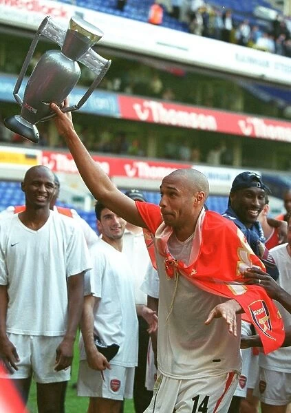 Thierry Henry's Glory: Arsenal Clinch the Premier League Title at White Hart Lane (2004)