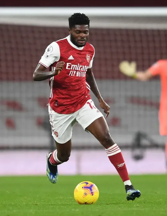 Framed Print : Thomas Partey in Action: Arsenal vs Manchester United (2020-21) - Emirates Stadium under COVID-19 Restrictions