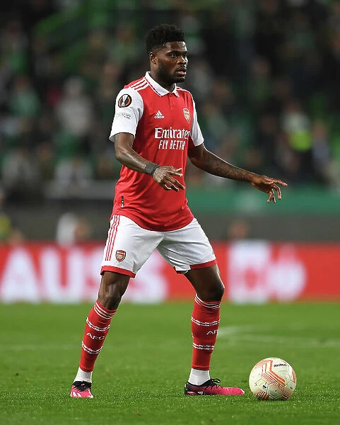 Thomas Partey in Action: Arsenal vs. Sporting CP - UEFA Europa League Round of 16, Lisbon 2023