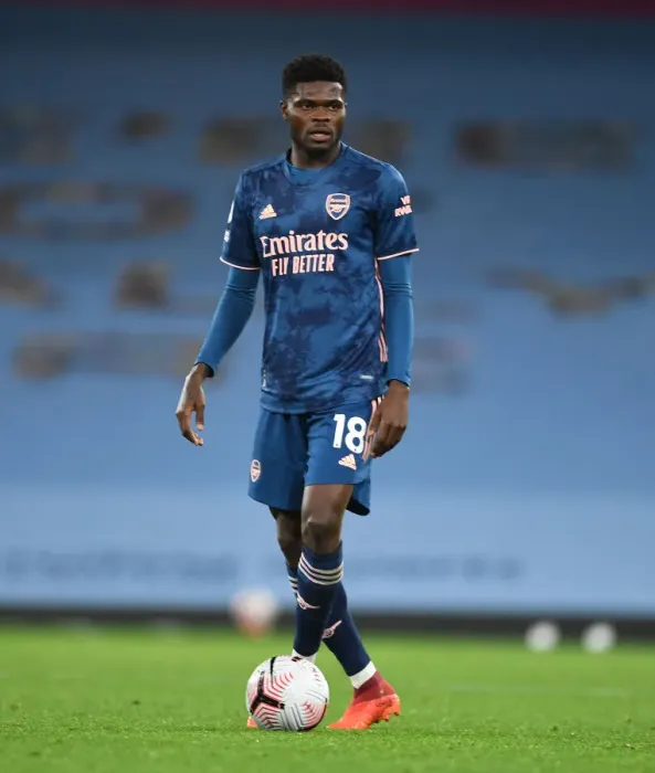 Framed Print : Thomas Partey: Arsenal's Midfield Star Shines in Empty Etihad Stadium