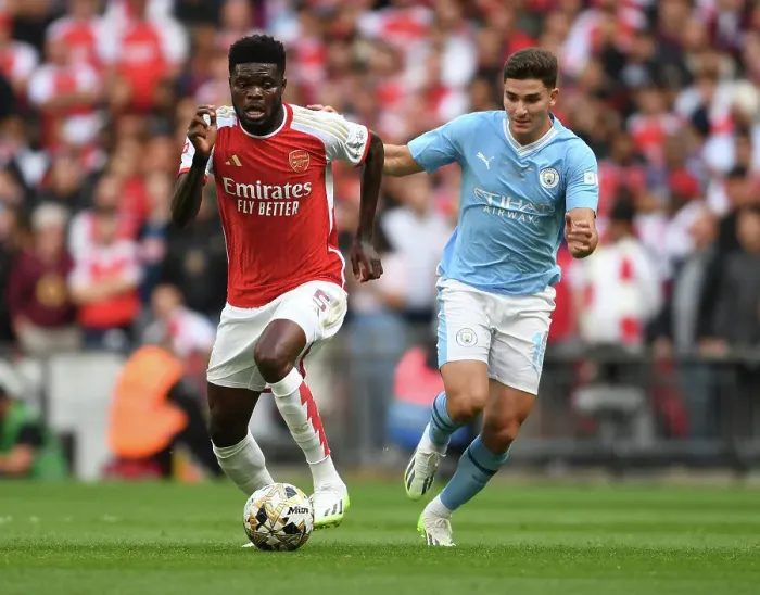 Framed Print : Thomas Partey Breaks Past Manchester City's Julian Alvarez in Arsenal's Community Shield Clash (2023-24)