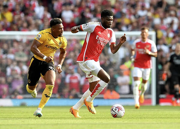 Thomas Partey Chases Down Adama Traore: Intense Moment from Arsenal vs. Wolverhampton Wanderers (2022-23)