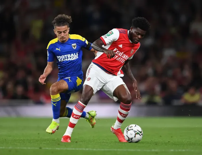 Framed Print : Thomas Partey Clashes with Ayoub Assal: Arsenal vs AFC Wimbledon in Carabao Cup