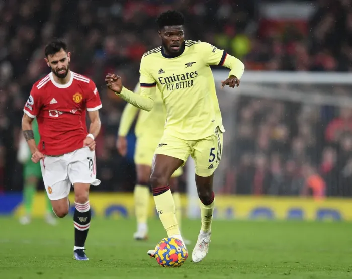 Framed Print : Thomas Partey Faces Off Against Manchester United in Premier League Clash