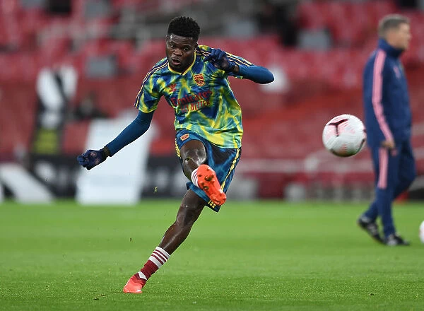 Thomas Partey Gears Up: Arsenal vs Leicester at Empty Emirates Stadium (2020-21)