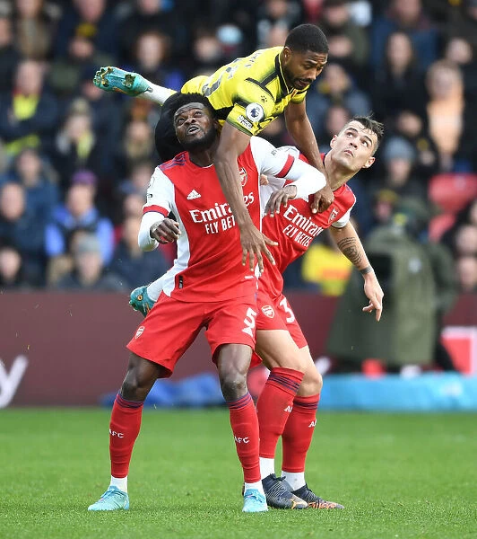 Thomas Partey and Granit Xhaka Clash with Emmanuel Dennis in Intense Watford vs. Arsenal Premier League Encounter