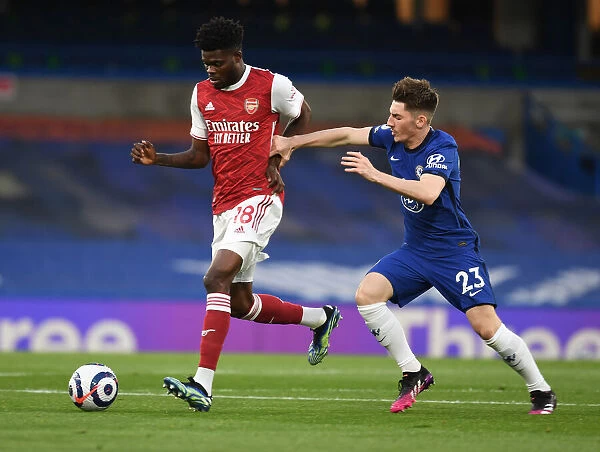 Thomas Partey Outmuscles Billy Gilmour: A Midfield Showdown at Empty Stamford Bridge (2020-21) - Chelsea vs. Arsenal, Premier League