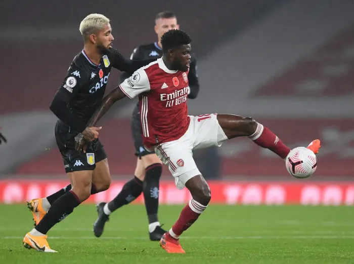 Framed Print : Thomas Partey vs Douglas Luiz: A Midfield Showdown in Arsenal vs Aston Villa Premier League Clash