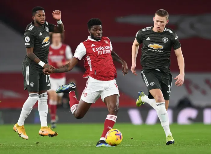 Framed Print : Thomas Partey vs. Fred and McTominay: A Battle in the Empty Emirates - Arsenal vs. Manchester United, Premier League 2021
