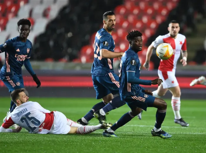 Framed Print : Thomas Partey vs Jakub Hromada: Arsenal's Europa League Battle at Empty Eden Arena Against Slavia Praha