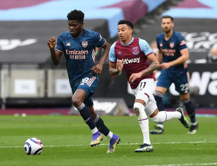 Framed Print : Thomas Partey vs. Jesse Lingard: Battle in the Premier League - West Ham United vs. Arsenal