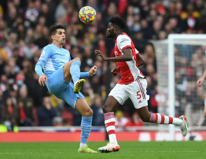 Framed Print : Thomas Partey vs Joao Cancelo: Heading Battle at the Emirates - Arsenal vs Manchester City, Premier League 2021-22