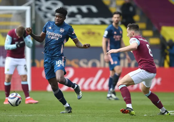 Framed Print : Thomas Partey vs. Josh Brownhill: A Battle at Turf Moor in the Empty Premier League