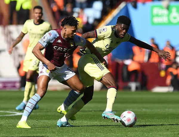 Thomas Partey vs. Ollie Watkins: Intense Battle at Villa Park - Aston Villa vs. Arsenal, Premier League