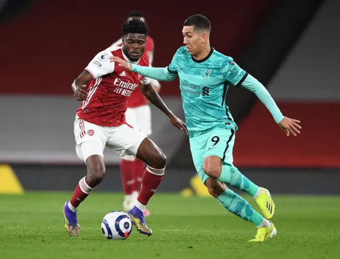 Framed Print : Thomas Partey vs. Roberto Firmino: A Battle at Emirates Stadium - Arsenal vs. Liverpool, 2021 (Behind Closed Doors) Framed Print : Thomas Partey vs. Roberto Firmino: A Battle at Emirates Stadium - Arsenal vs. Liverpool, 2021 (Behind Closed Doors)