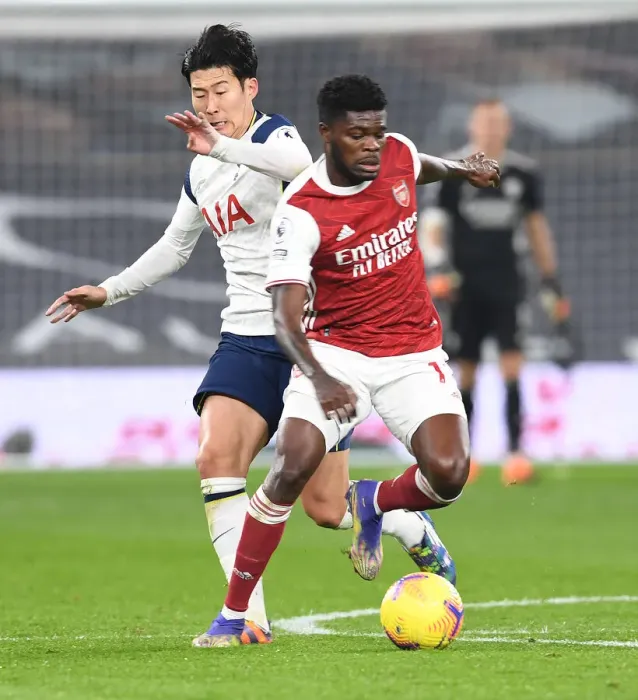 Framed Print : Thomas Partey's Dominance: Arsenal's Premier League Triumph Over Tottenham - Partey Outmuscles Son Heung-Min Framed Print : Thomas Partey's Dominance: Arsenal's Premier League Triumph Over Tottenham - Partey Outmuscles Son Heung-Min