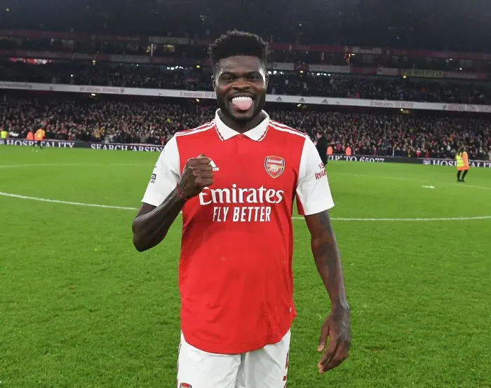 Framed Print : Thomas Partey's Triumphant Moment: Arsenal's Euphoric Victory Over Manchester United (2022-23)