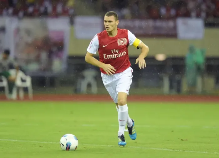 Framed Print : Thomas Vermaelen in Action: Arsenal's Pre-Season Clash with Hangzhou Greentown (2011)