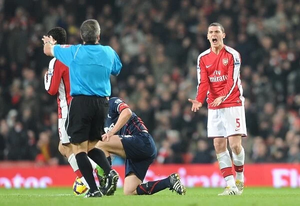 Thomas Vermaelen (Arsenal) argues with referee Alan Wiley. Arsenal 4: 2 Bolton Wanderers