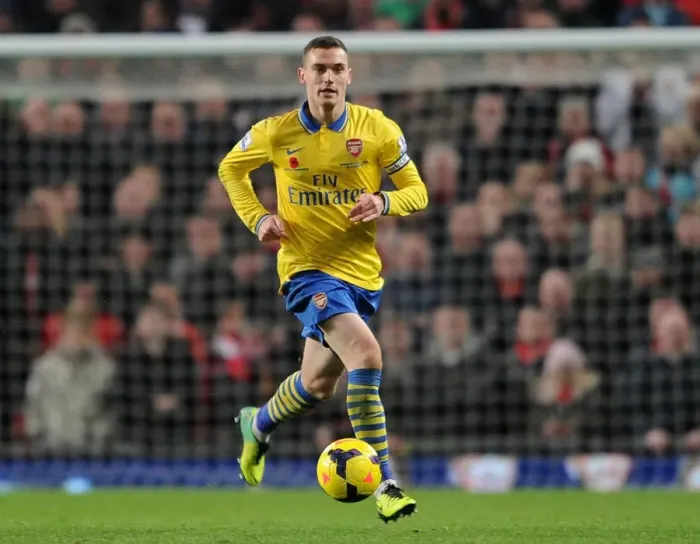 Framed Print : Thomas Vermaelen: Arsenal at Old Trafford Against Manchester United (2013-14) Framed Print : Thomas Vermaelen: Arsenal at Old Trafford Against Manchester United (2013-14)