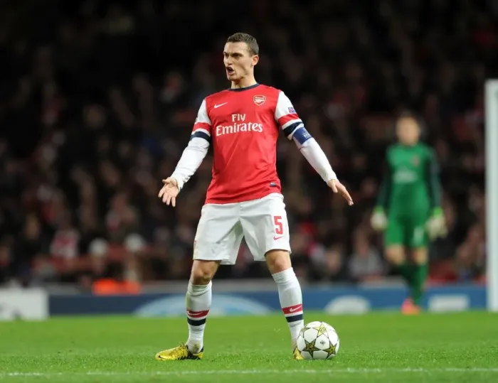 Framed Print : Thomas Vermaelen: Arsenal's Unyielding Defender in Action against Montpellier, UEFA Champions League 2012-13