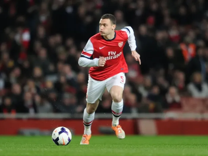 Framed Print : Thomas Vermaelen: Arsenal's Unyielding Defender in the Battle Against Swansea City (2013-14) Framed Print : Thomas Vermaelen: Arsenal's Unyielding Defender in the Battle Against Swansea City (2013-14)