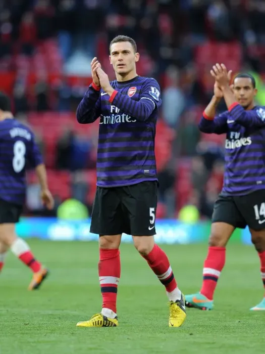 Framed Print : Thomas Vermaelen Celebrates with Arsenal Fans: Manchester United vs. Arsenal (2012-13) Framed Print : Thomas Vermaelen Celebrates with Arsenal Fans: Manchester United vs. Arsenal (2012-13)