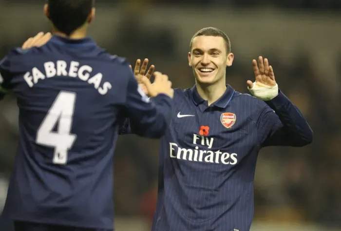 Framed Print : Thomas Vermaelen and Cesc Fabregas celebrate the 4th Arsenal goal