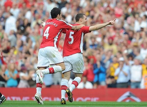 Thomas Vermaelen and Cesc Fabregas: Celebrating Arsenal's 4-0 Goal Against Wigan Athletic, 2009