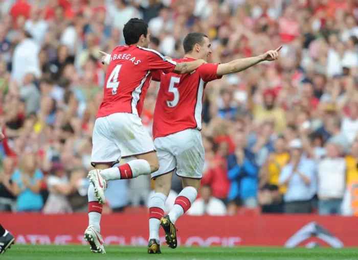 Framed Print : Thomas Vermaelen and Cesc Fabregas: Celebrating Arsenal's 4-0 Goal Against Wigan Athletic, 2009