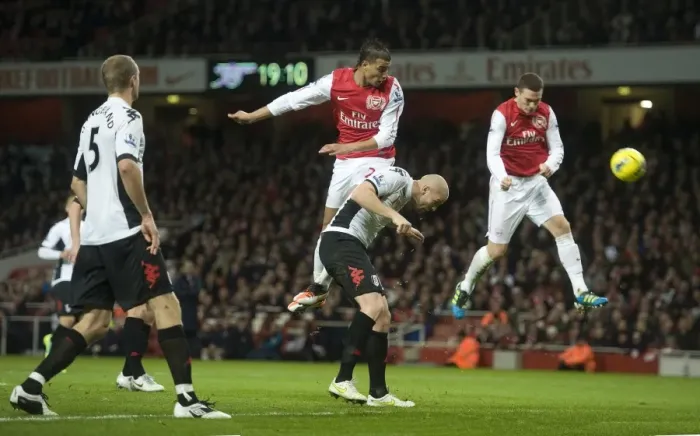 Framed Print : Thomas Vermaelen heads past ther Fulham defence to score the Arsenal goal during the Barclays Premier League match between Arsenal and Fulham at Emirates Stadium on November 26, 2011 in London, England. Credit; Arsenal Framed Print : Thomas Vermaelen heads past ther Fulham defence to score the Arsenal goal during the Barclays Premier League match between Arsenal and Fulham at Emirates Stadium on November 26, 2011 in London, England. Credit; Arsenal