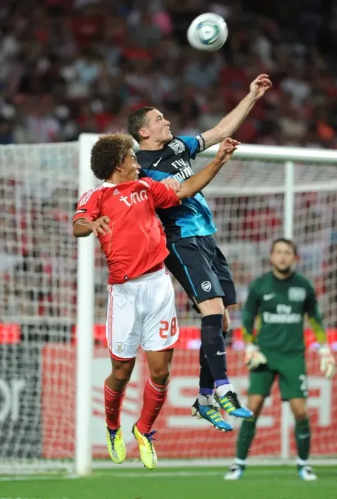 Framed Print : Thomas Vermaelen Soaring High: Benfica vs. Arsenal, 2011 Pre-Season Clash at Estadio da Luz Framed Print : Thomas Vermaelen Soaring High: Benfica vs. Arsenal, 2011 Pre-Season Clash at Estadio da Luz