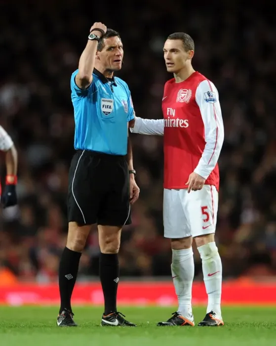 Framed Print : Thomas Vermaelen vs. Andre Marriner: A Clash at the Emirates