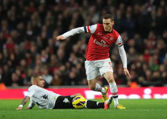 Framed Print : Thomas Vermaelen vs. Ashkan Dejagah: A Football Battle at Emirates Stadium (Arsenal vs. Fulham, 2012-13)