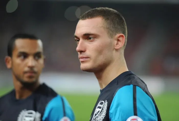 Framed Print : Thomas Vermaelen's Dominance: Arsenal Crushes Malaysia XI 4-0 at Bukit Jalil Stadium