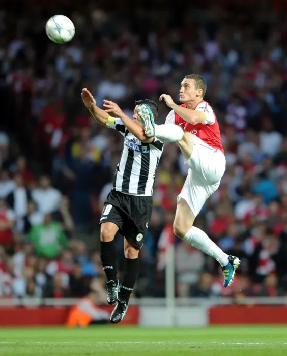 Framed Print : Thomas Vermaelen's Header: Arsenal Takes 1-0 Lead Over Udinese in UEFA Champions League Framed Print : Thomas Vermaelen's Header: Arsenal Takes 1-0 Lead Over Udinese in UEFA Champions League