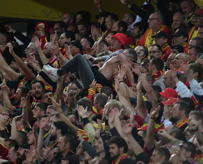Framed Print : Thrilling Champions League Moment: RC Lens Fan's Epic Crowd Surfing Amidst the Tension vs. Arsenal Framed Print : Thrilling Champions League Moment: RC Lens Fan's Epic Crowd Surfing Amidst the Tension vs. Arsenal