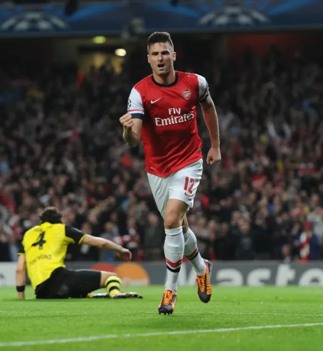 Framed Print : Thrilling Goal: Olivier Giroud's Stunner for Arsenal vs Borussia Dortmund in the UEFA Champions League (2013)