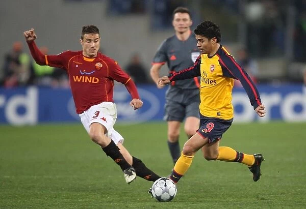 The Thrilling Penalty Shootout: Arsenal's Eduardo vs. Roma's Matteo Brighi in the UEFA Champions League