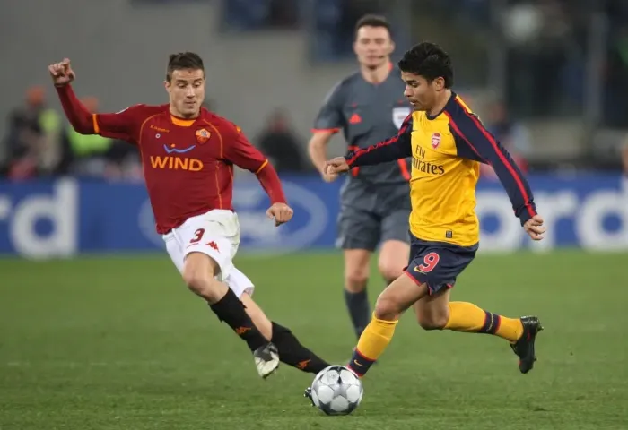 Framed Print : The Thrilling Penalty Shootout: Arsenal's Eduardo vs. Roma's Matteo Brighi in the UEFA Champions League