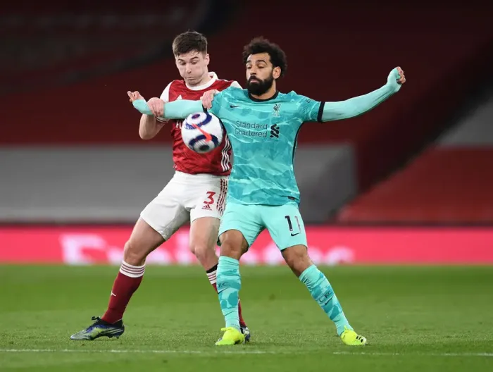 Framed Print : Tierney vs. Salah: A Premier League Showdown at Emirates Stadium - Arsenal vs. Liverpool