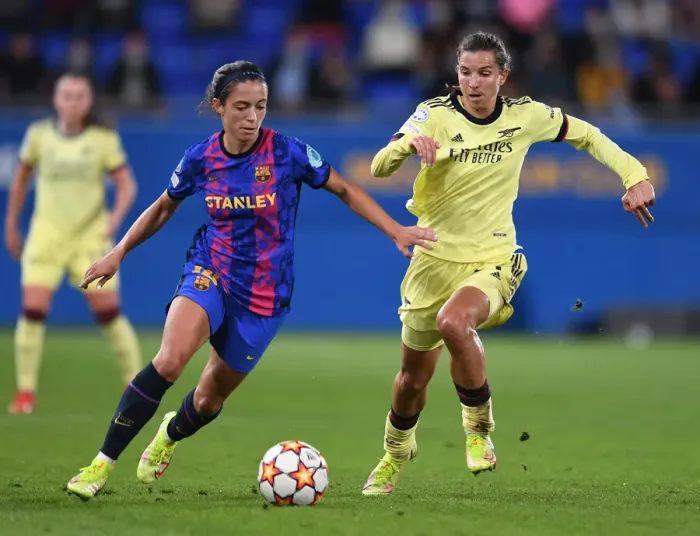 Framed Print : Tobin Heath vs. Aitana Bonmati: Battle in the UEFA Women's Champions League - Barcelona v Arsenal