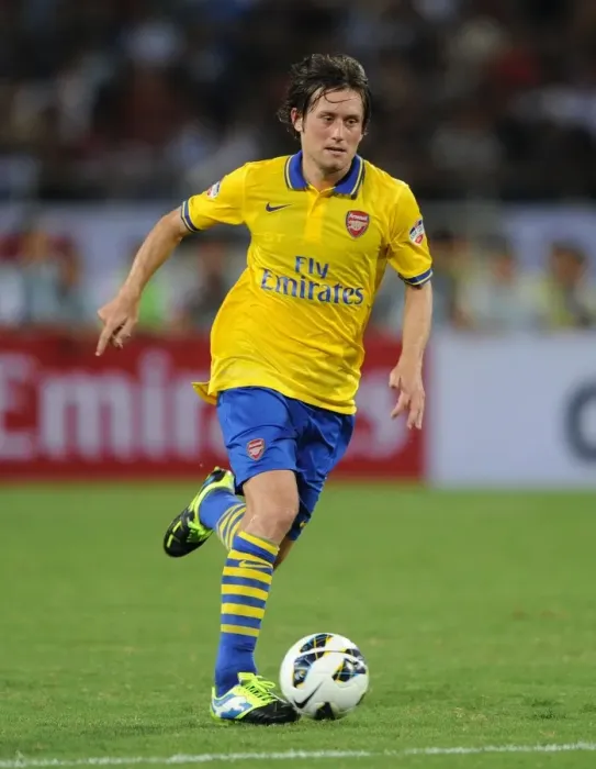 Framed Print : Tomas Rosicky in Action for Arsenal against Vietnam (2013-14) Framed Print : Tomas Rosicky in Action for Arsenal against Vietnam (2013-14)